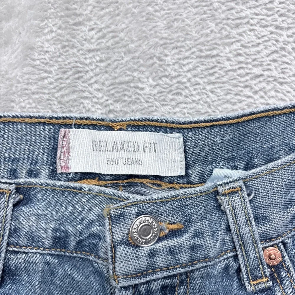 Vintage Y2K Levi's 550 Relaxed Fit Jeans Mens 34x34 Light Wash Blue Tapered Leg